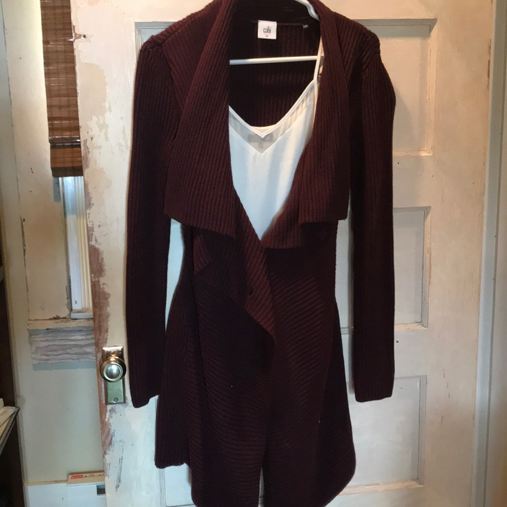 Maroon cardigan with gold button closure